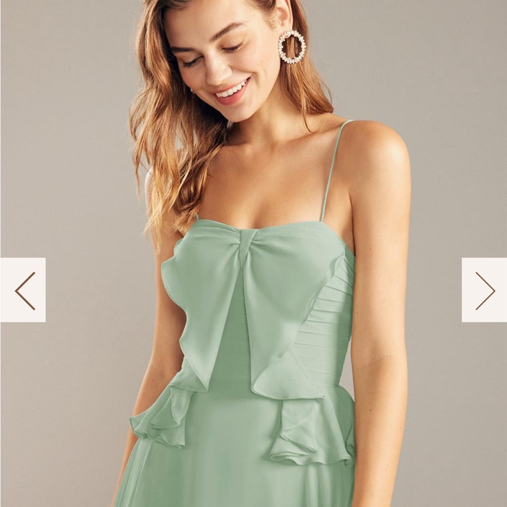 Dainty Sage Green Gown With Flare Folds